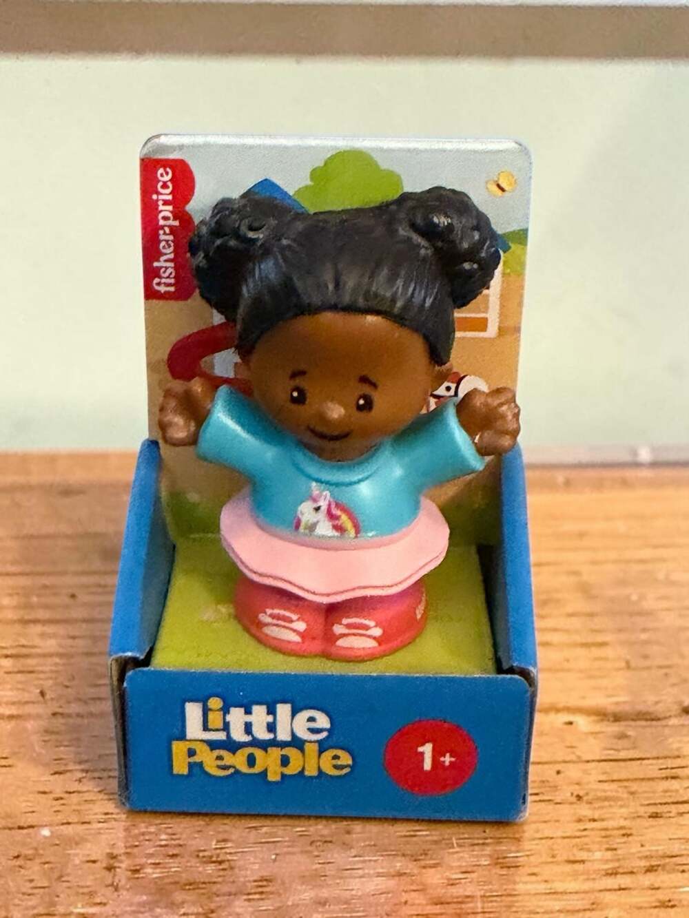 Fisher-Price Little People Single Figure Girl with Unicorn Top and Pink Skirt